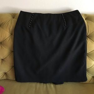 Black high-waisted knee length skirt flounce hem